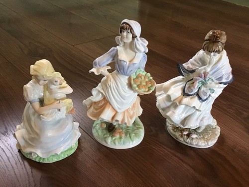 Three porcelain figures - three,