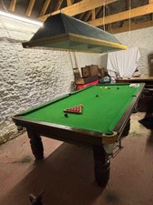 Slate bed snooker table, 10' by 5'; handsome old thing; needs new baize