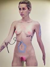 miley cyrus signed 8.5 x 11