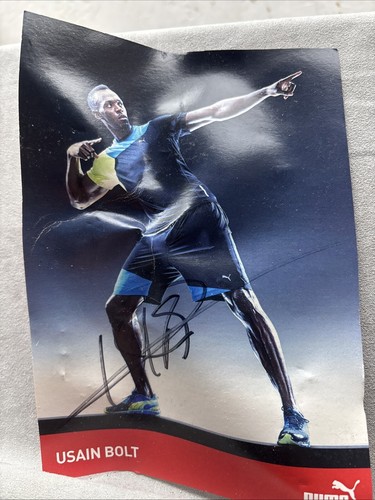 Usain bolt autographed - usain,