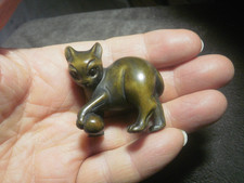 Hand Carved wood netsuke of a