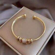 Gold Bangle Ball Open Torque