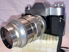 Zenit 3M 35mm film camera with Jupiter 11 4/135 lens. Tested & working.