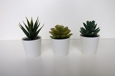 3 artificial plants from Ikea  White pot green plants 