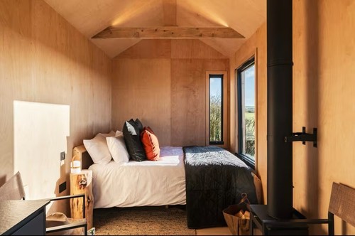 Tiny home cabin wheels - on,