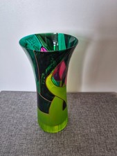Green glass vase with tulip