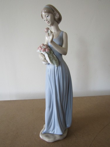 Nao lladro figurine - by,