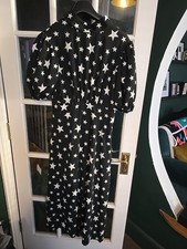 John Zack Dress BNWT.. Size 16. 82cm Waist.. Stars. Opened Back