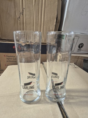 Carling half pint glasses - half,