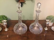 A FINE QUALITY PAIR OF ANTIQUE FLORAL ENGRAVED ,VICTORIAN GLASS DECANTERS.