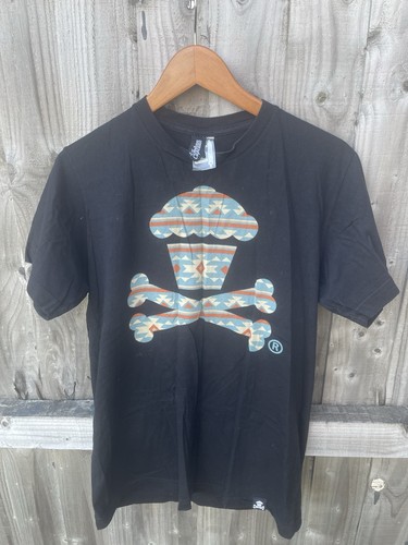 Johnny cupcakes aztec - johnny, logo