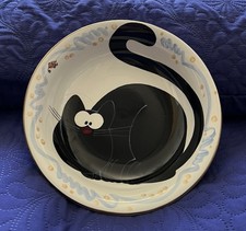 ‘JUMPING PLATES' BLACK CAT