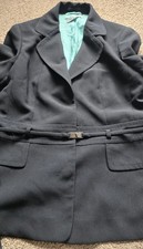 Designer: PLANET. Black Suit