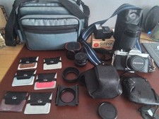 Pentax Asahi K1000 SLR Camera, Guardsman Case, Sirius Zoom, Sunpak MX118 Flash