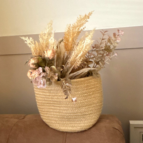 Round beige wicker basket with - round,