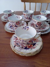 6 Booths Fresian Trios: cups, saucers, plates. Blue, red with gold trim 