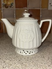 White ceramic teapot
