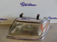 Mitsubishi Shogun Headlight Sport 99-06 Passenger left Front chrome trim