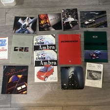 Bundle of car brochures The