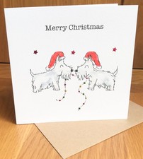 Christmas Card Cute West Highland Terrier dogs with lights and stars Westies