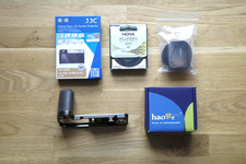 Fuji X100V accessory kit (grip, lens hood, filter, screen protectors)