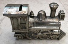 Vintage silver metal steam - a,