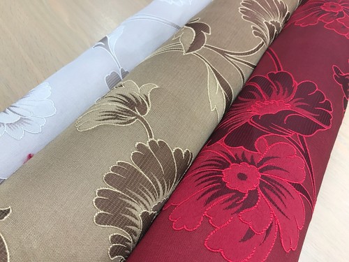Embossed curtain fabric