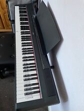 Yamaha P-115 digital piano with case