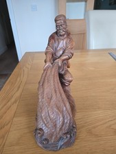 A vintage hand carved hardwood