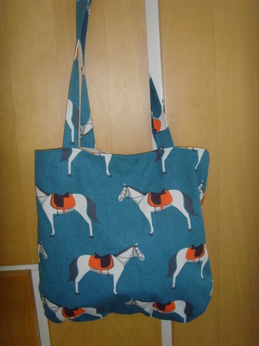 Made teal blue horse - in,