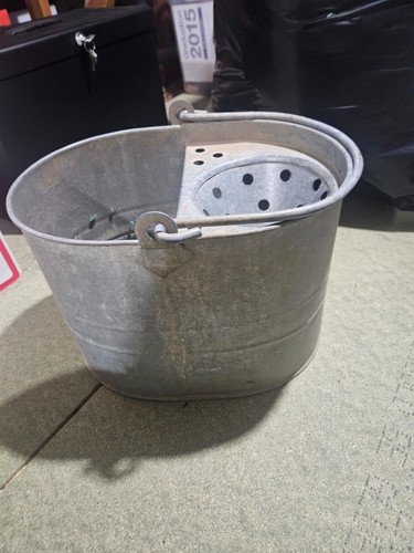 Old used galvanised metal - , mop