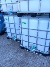FOOD GRADE IBC TANK AND CAGE ONLY USED ONCE PERFECT FOR DRINKING WATER OR ANIMAL