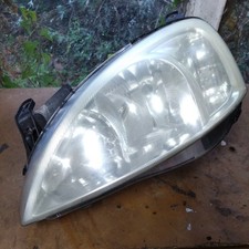 VAUXHALL CORSA C 00-06 PRE FACELIFT PASSENGER NEARSIDE LEFT HEADLIGHT SNX38
