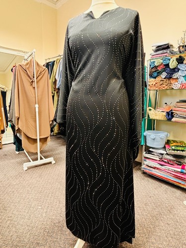 Black kaftan style glitter
