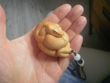 Carved wood netsuke python snake, with cord handle wood figure