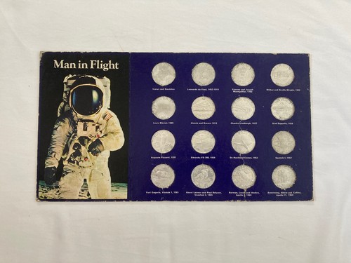 Shell man flight coin - man,
