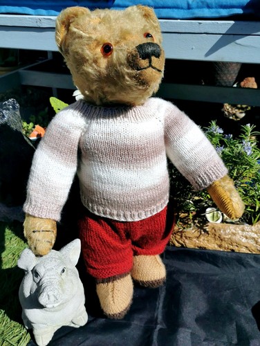 Hand knitted teddy bear