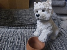 West Highland White Terrier Figure Holding A Bowl