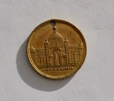 MEDAL OR TOKEN FOR "NEW ZEALAND & SOUTH SEAS EXHIBITION 1889-90", IN BRASS