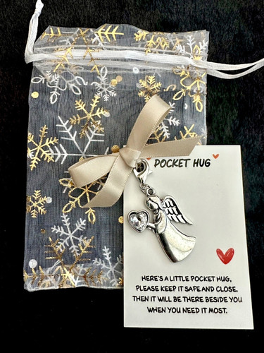 Winged angel holding clear - holding,