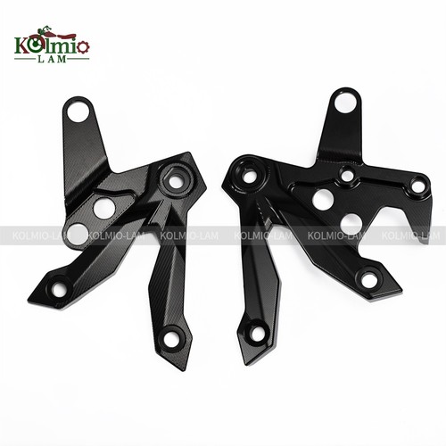 Front footrest bracket - front,