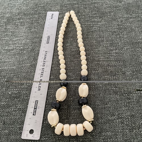 Black cream bead - black,