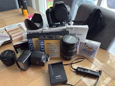 Black Canon EOS 550D 18.0 megapixels Digital SLR Camera with 18-55 mm zoom lens