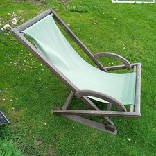 pair of hardwood rocking deck chairs