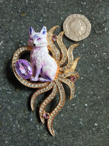 Gold tone enamel nine tailed - enamel,
