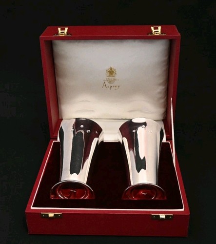 Asprey solid silver vases - &,