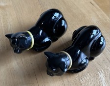 A Pair Of Vintage Avon Ceramic Cats Eau De Cologne Bottles.