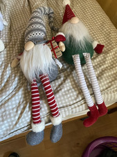 Two Large Christmas Gonks With Long Legs To Sit On A Shelf Or Cupboard
