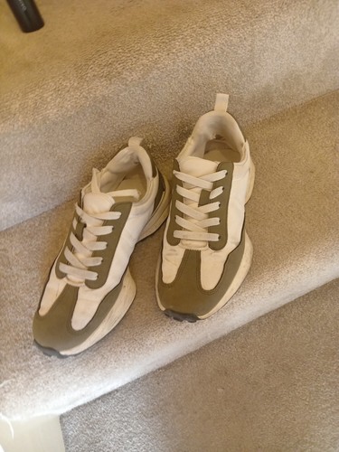 Khaki and cream - and, trainers