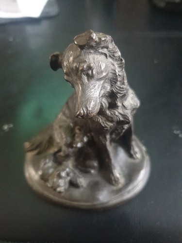 Collie and pups - and, statue
